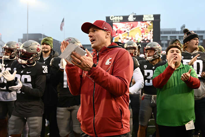 Nov 12, 2022; Pullman, Washington, USA; Washington State Cougars head coach Jake Dickert sings the school fight song after a game against the Arizona State Sun Devils at Gesa Field at Martin Stadium. Washington State won 28-18. Mandatory Credit: James Snook-USA TODAY Sports